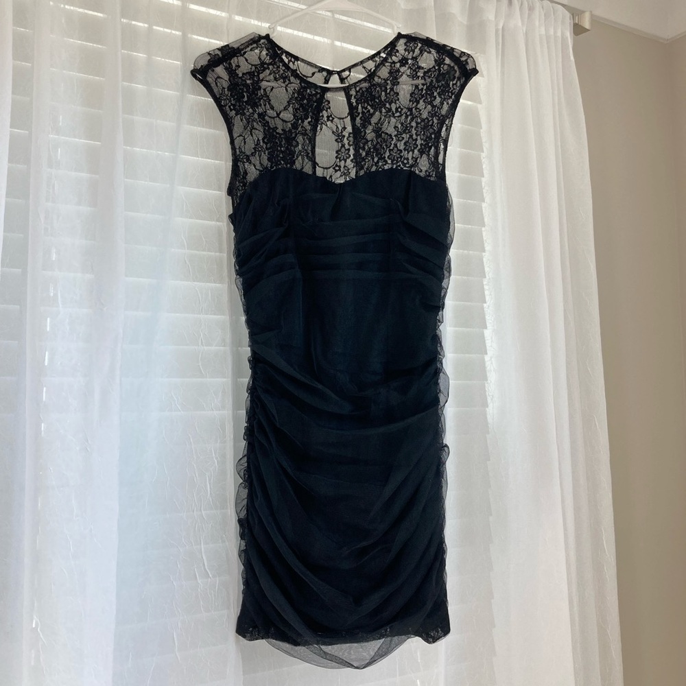 Black Nordstrom ruched, sweetheart neckline fitted dress.